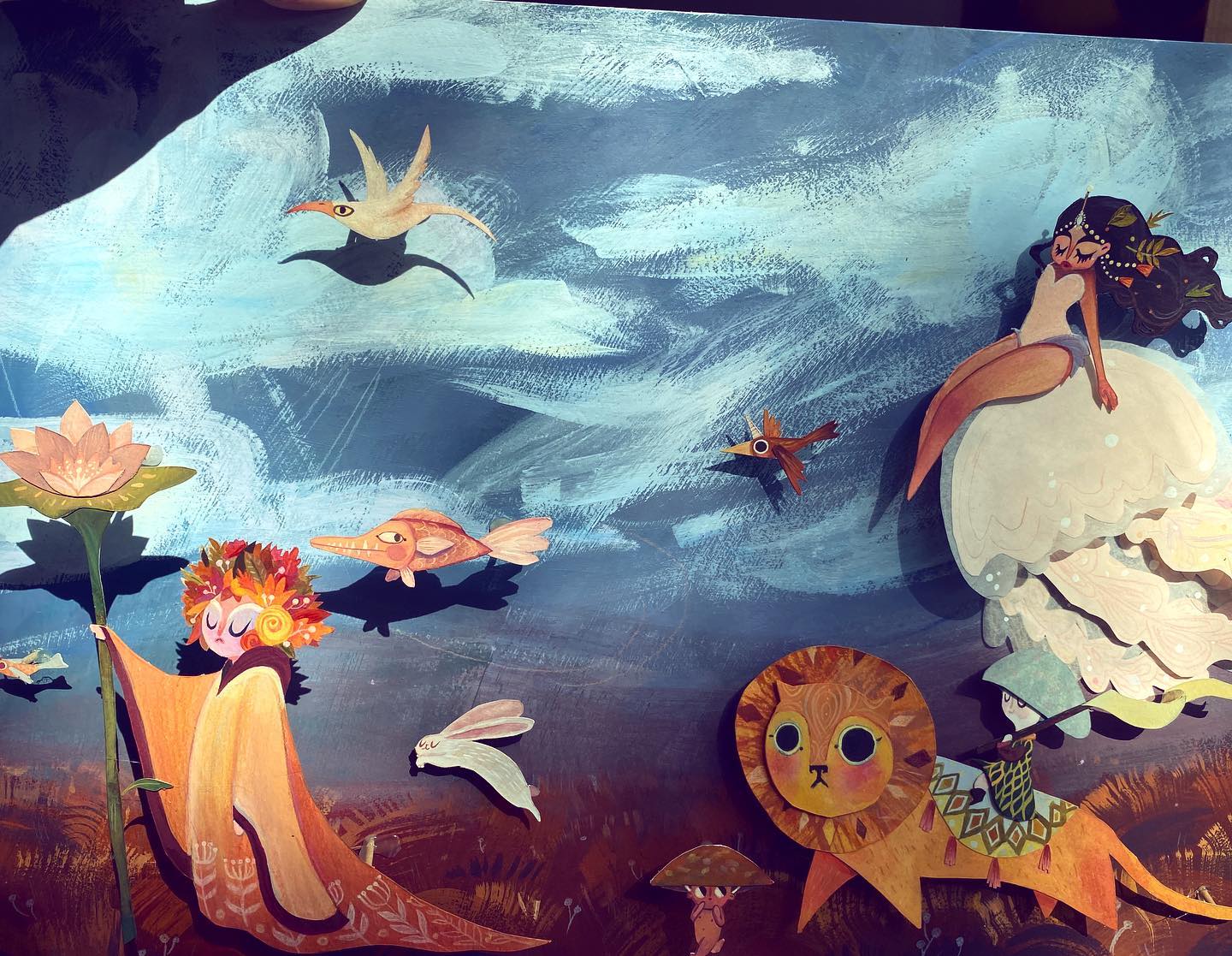 Fantasy scene with lion, mermaid, fairy, and bird