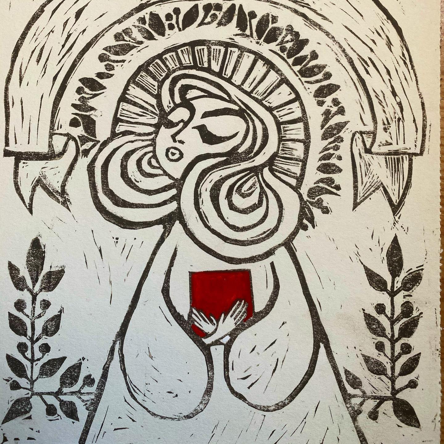Linocut print: Madonna with halo holding a red heart